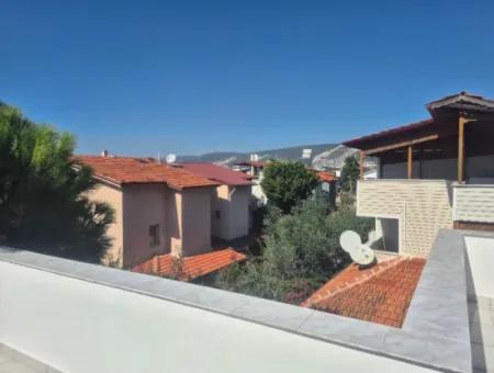 Akbük'te Satılık Bir Site İçinde Tripleks Villa.